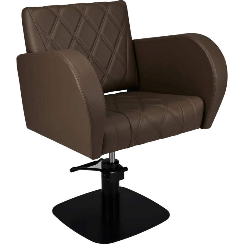Holly hairdressing chair with a wide seat, hydraulic pump, custom upholstery colours and decorative stitching for modern hair salons.